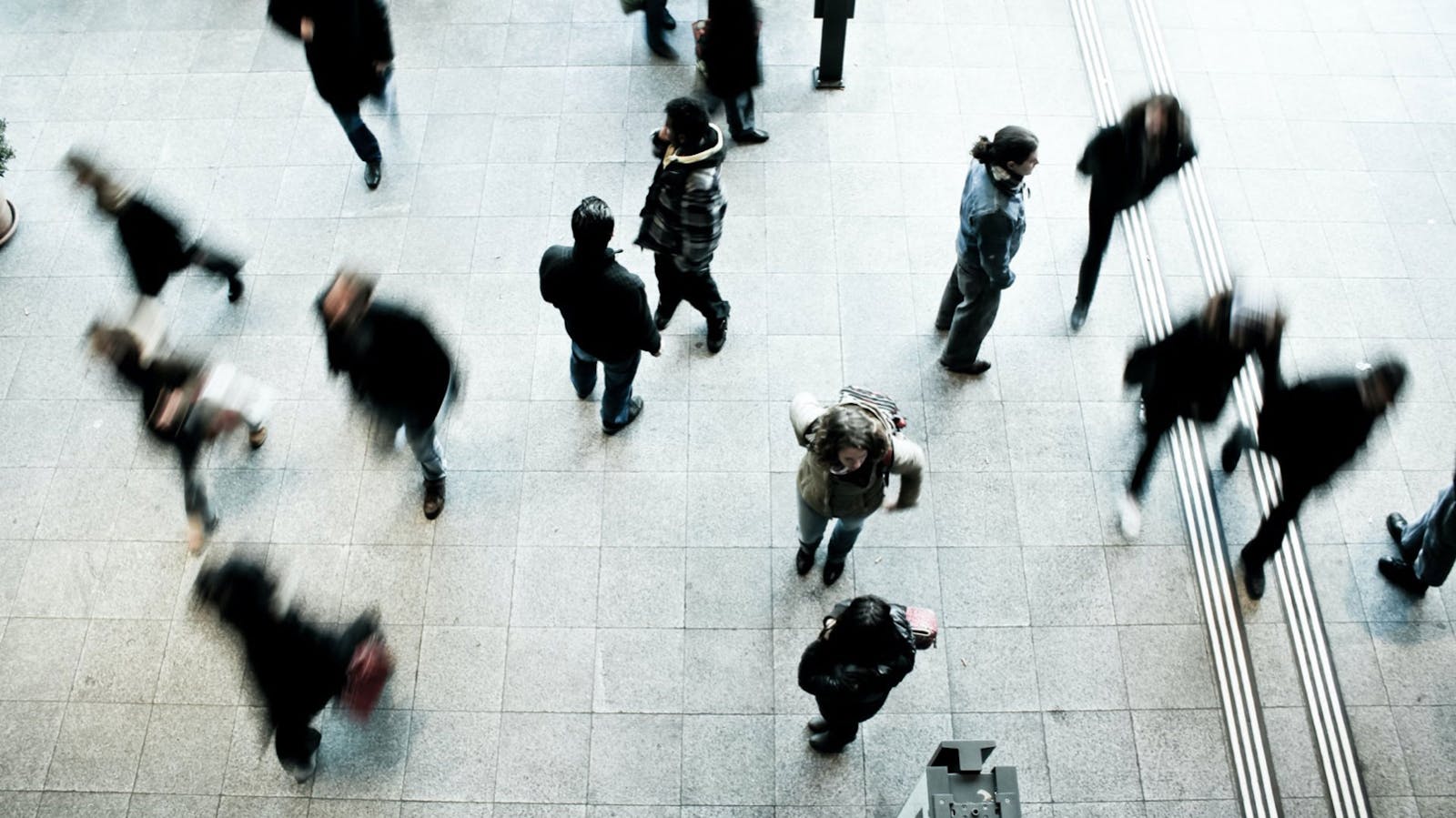 Time lapse of pedestrians walking from above
