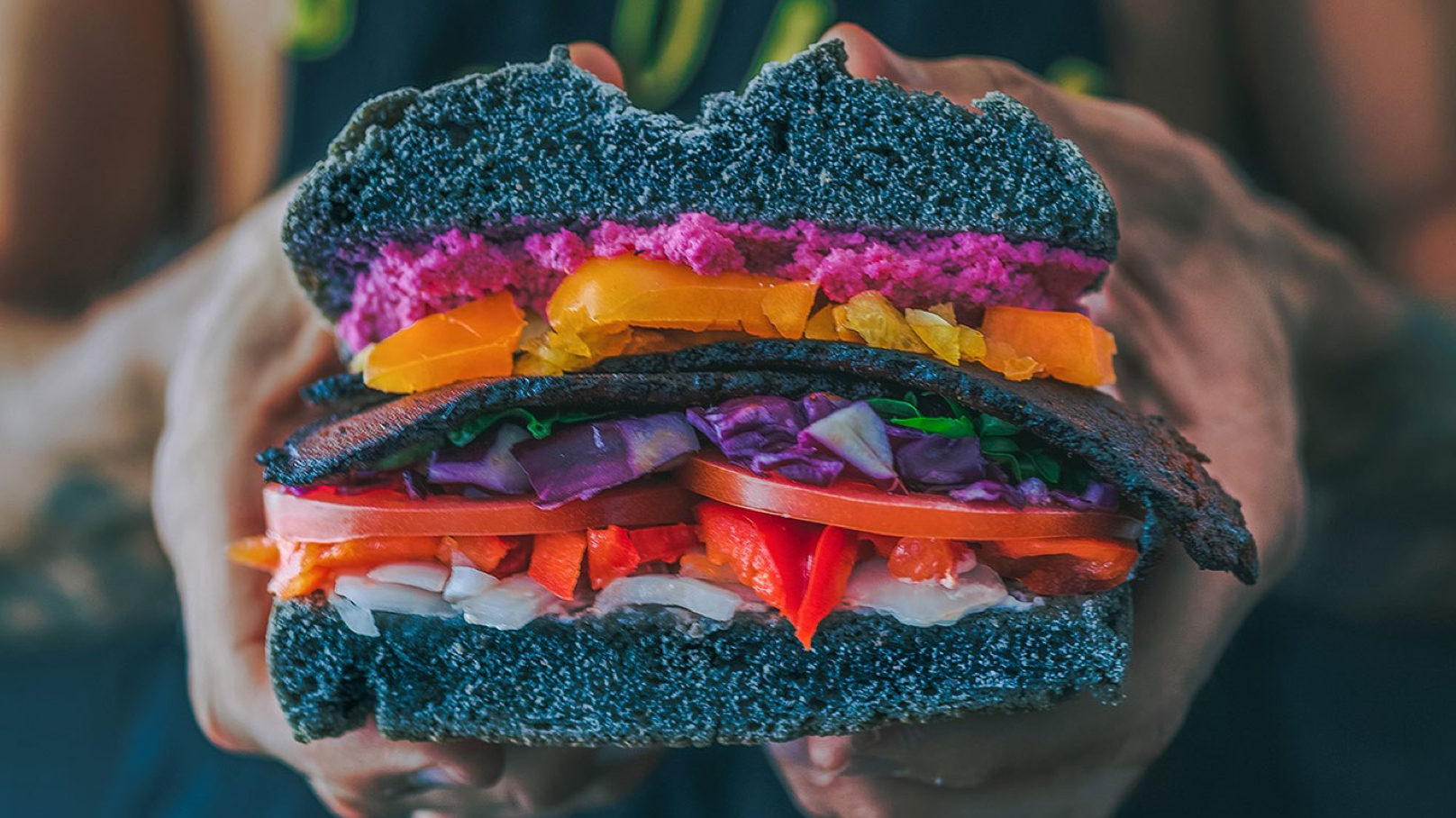 Vegan burger with vegetable filling and a black bun