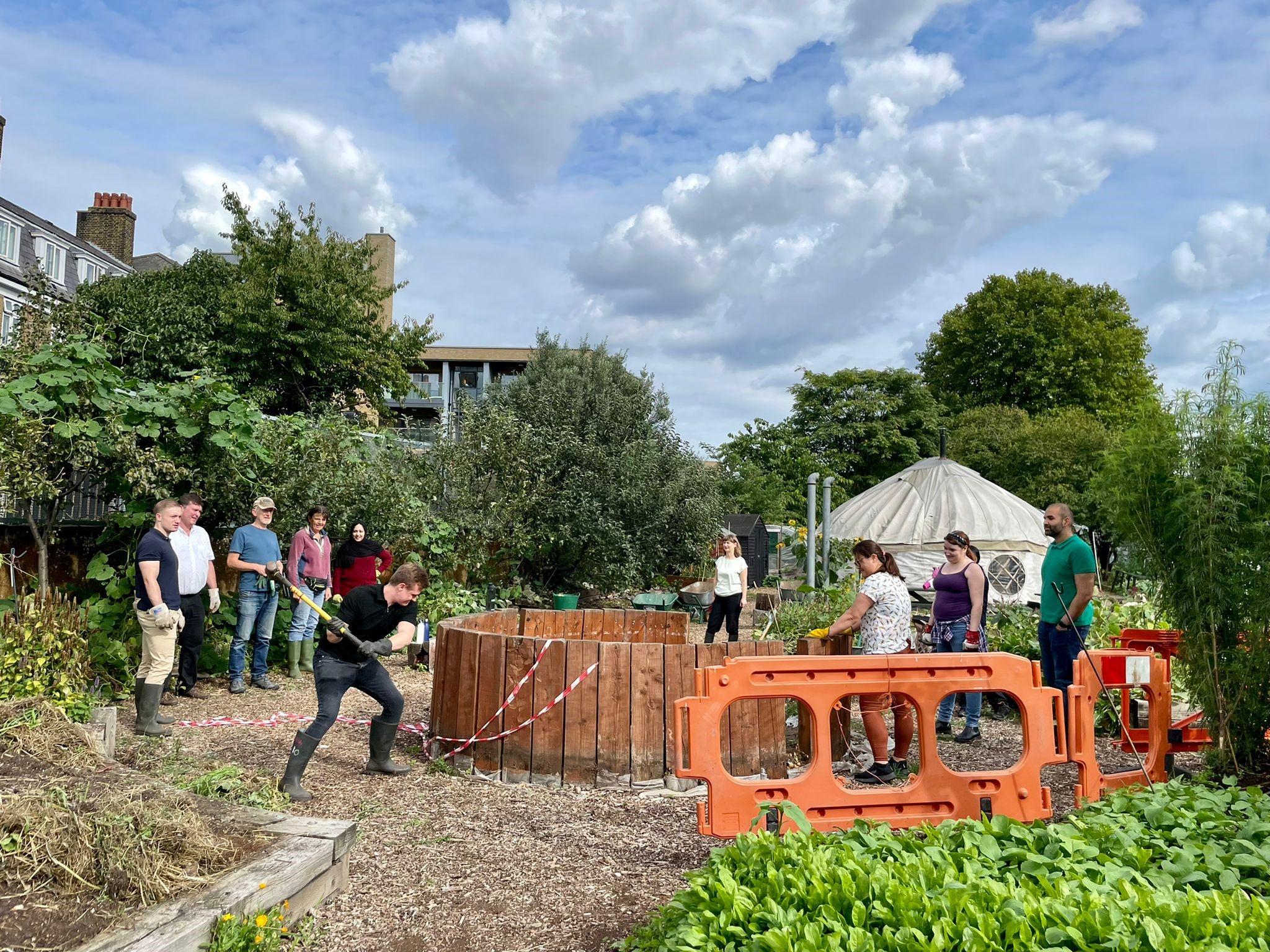 Some accountants dismantling an above-ground pond