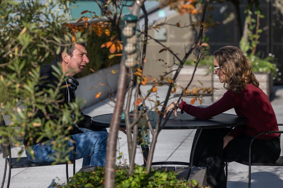 two colleagues chatting