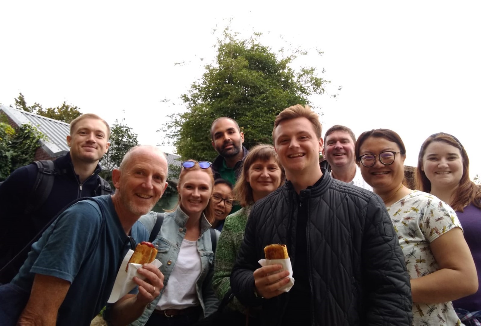 Accountants enjoying suasage rolls