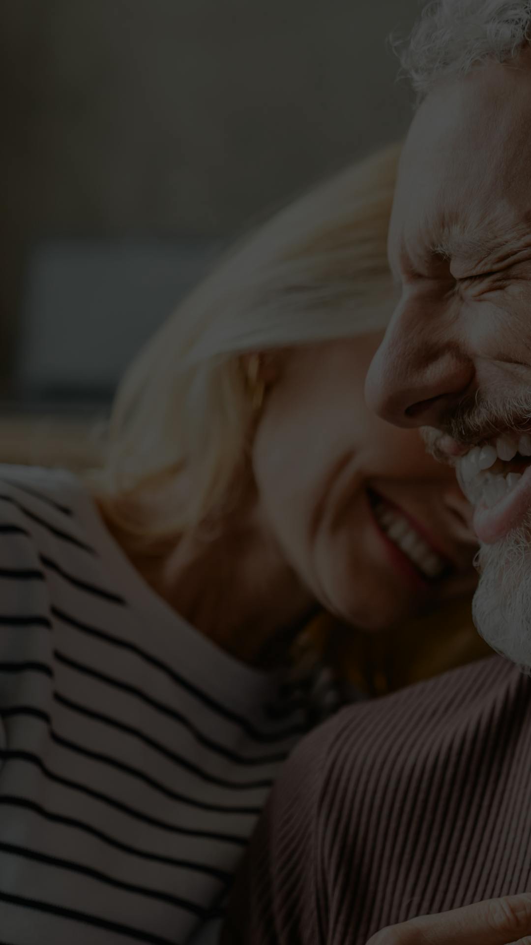 man and woman smiling