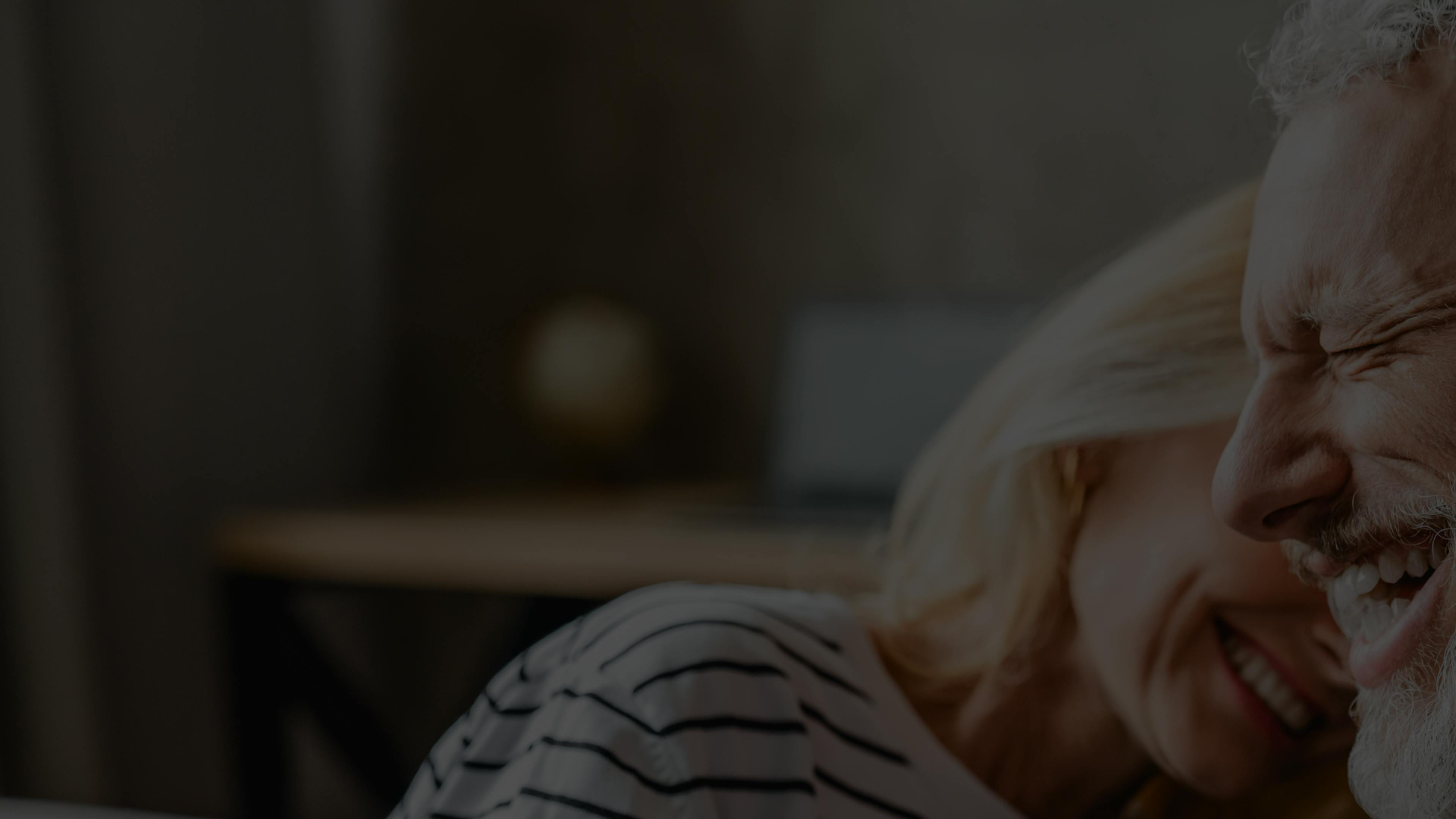 man and woman smiling