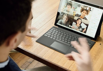 A person excitedly explaining a concept to a team on a video call
