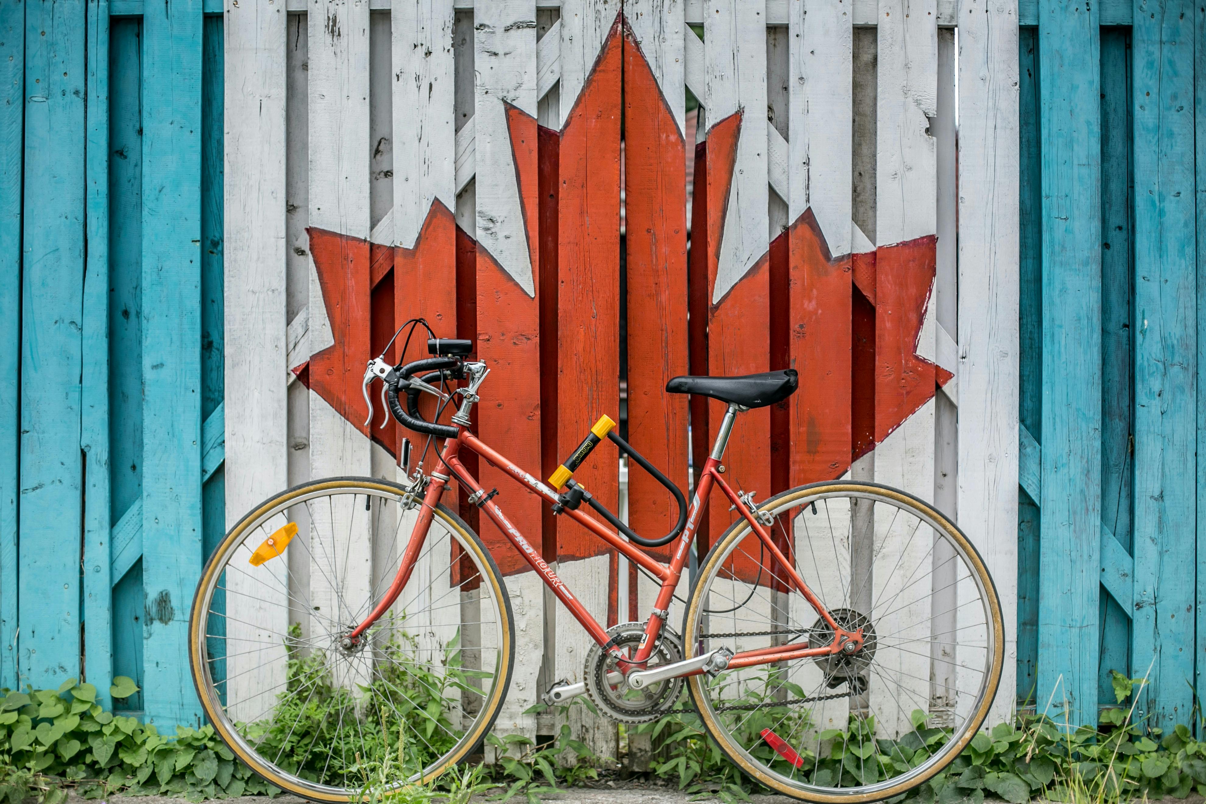 painted canada flag with bike in front
