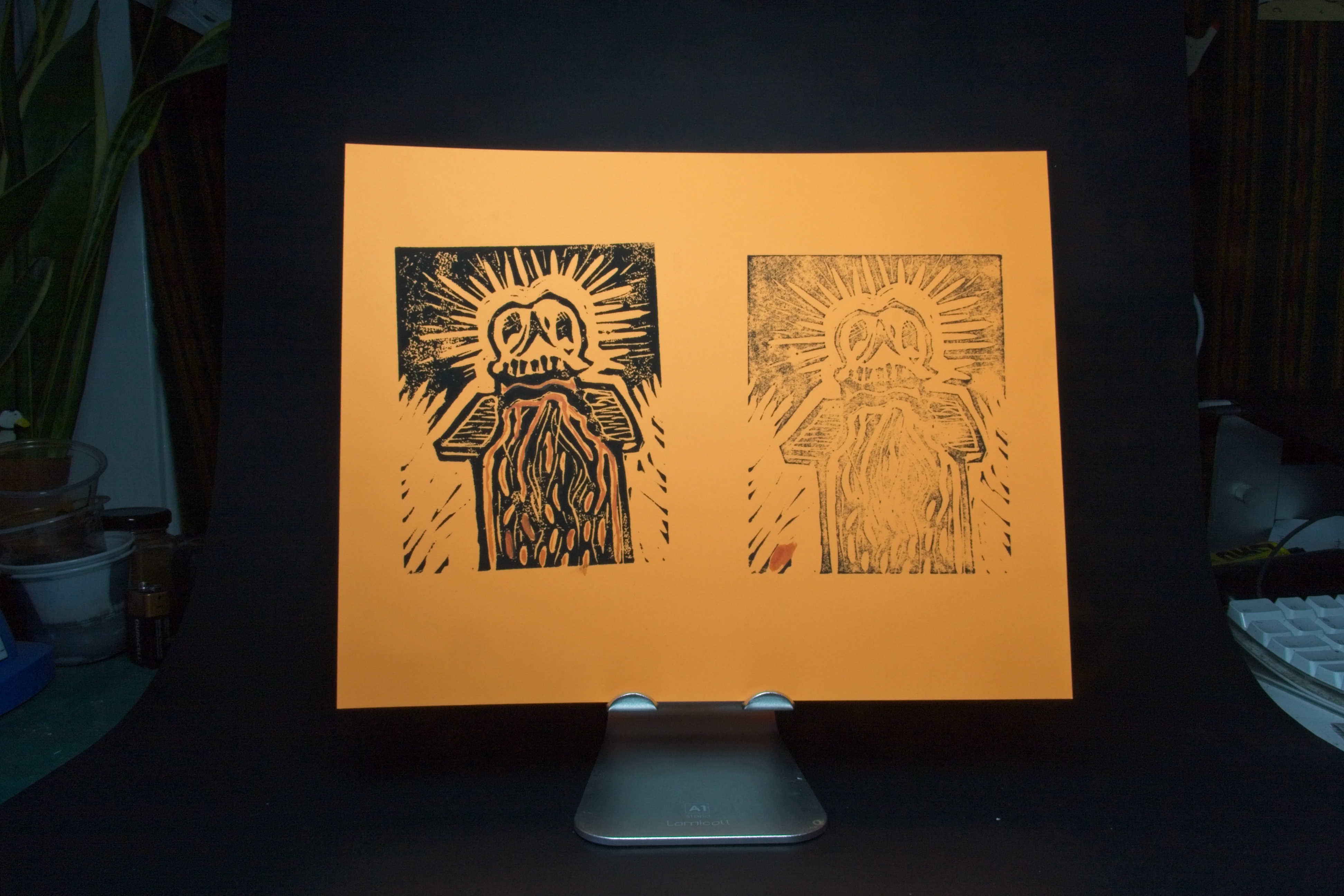 Skull lino print on an orange background