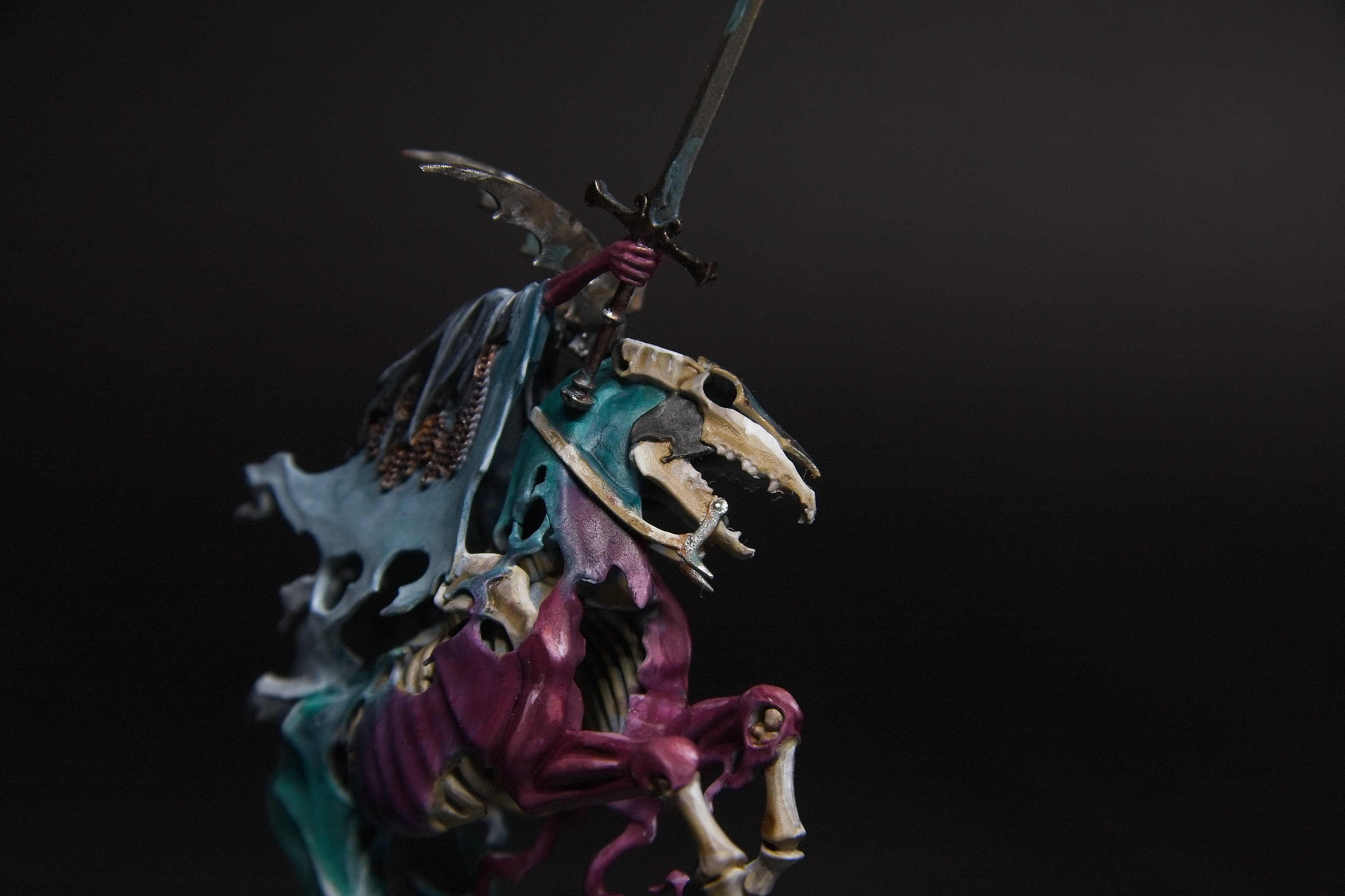 The bony legs give way to a fleshy hole in the chest.