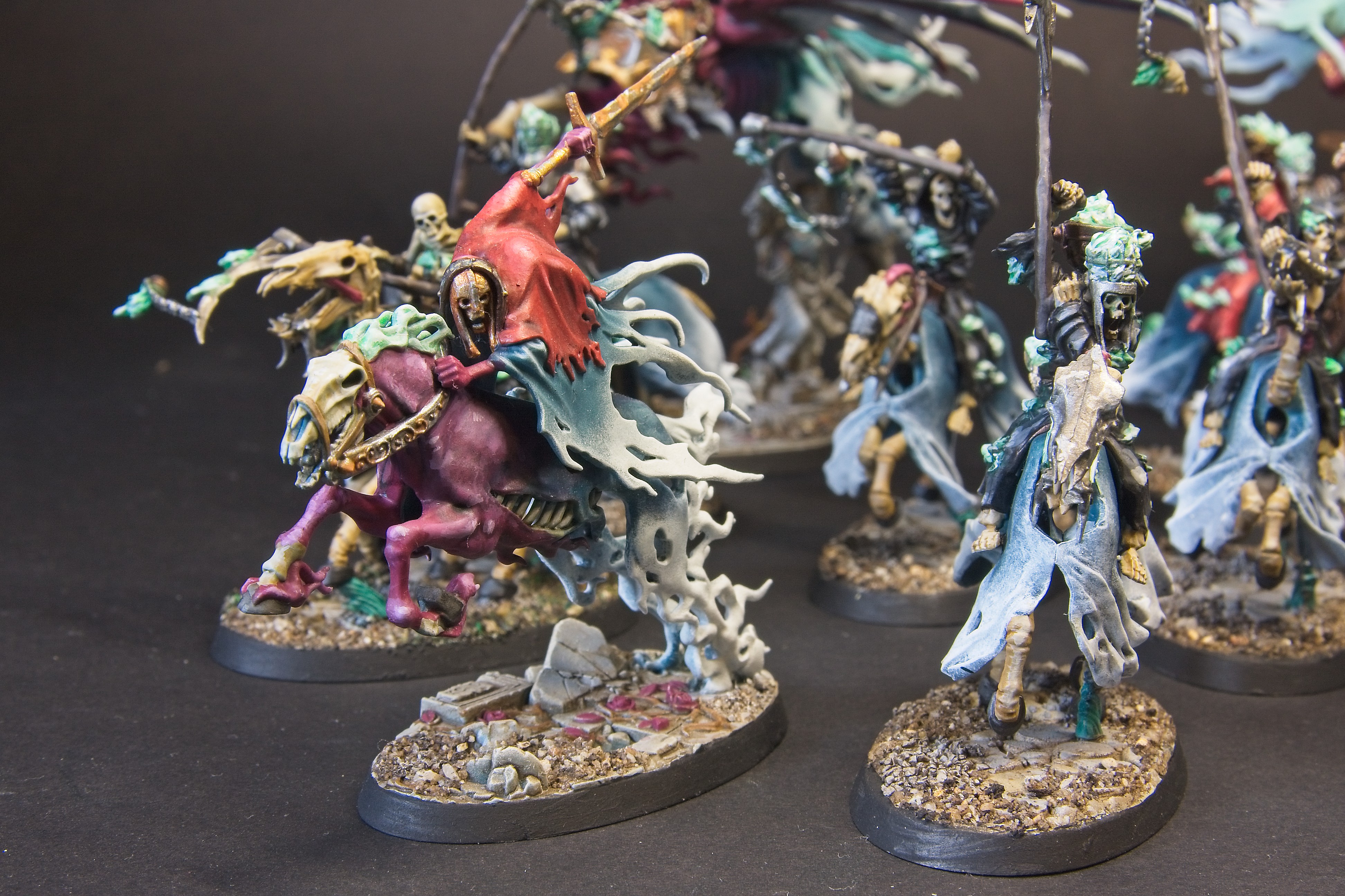 The dreadblade harrow leads the army, with a red cloak and a rusty blade.