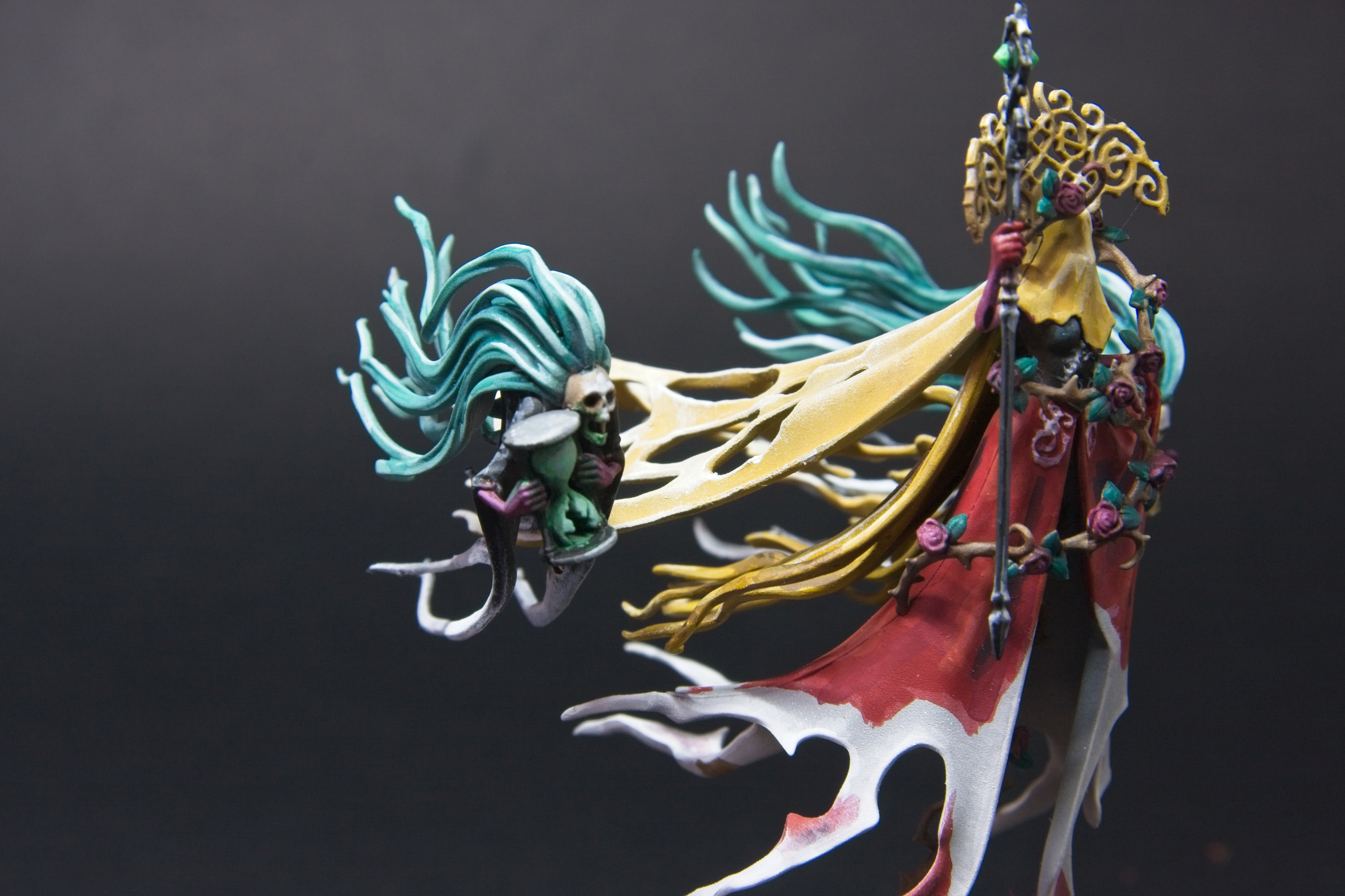 Olynder's right hand minion, holding a shattered hourglass glowing green