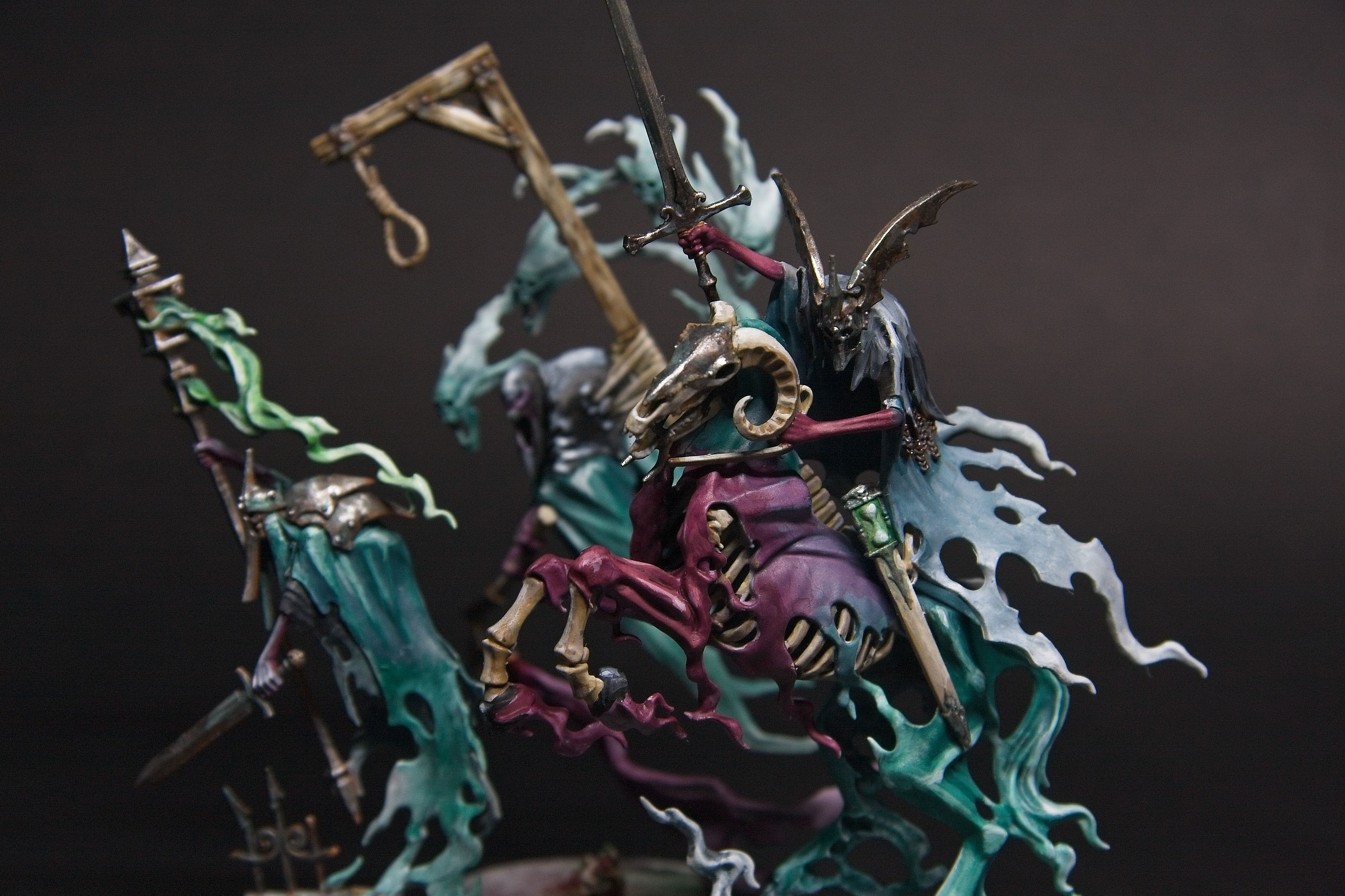 A knight of shrounds with a guardian of souls, and an executioner.