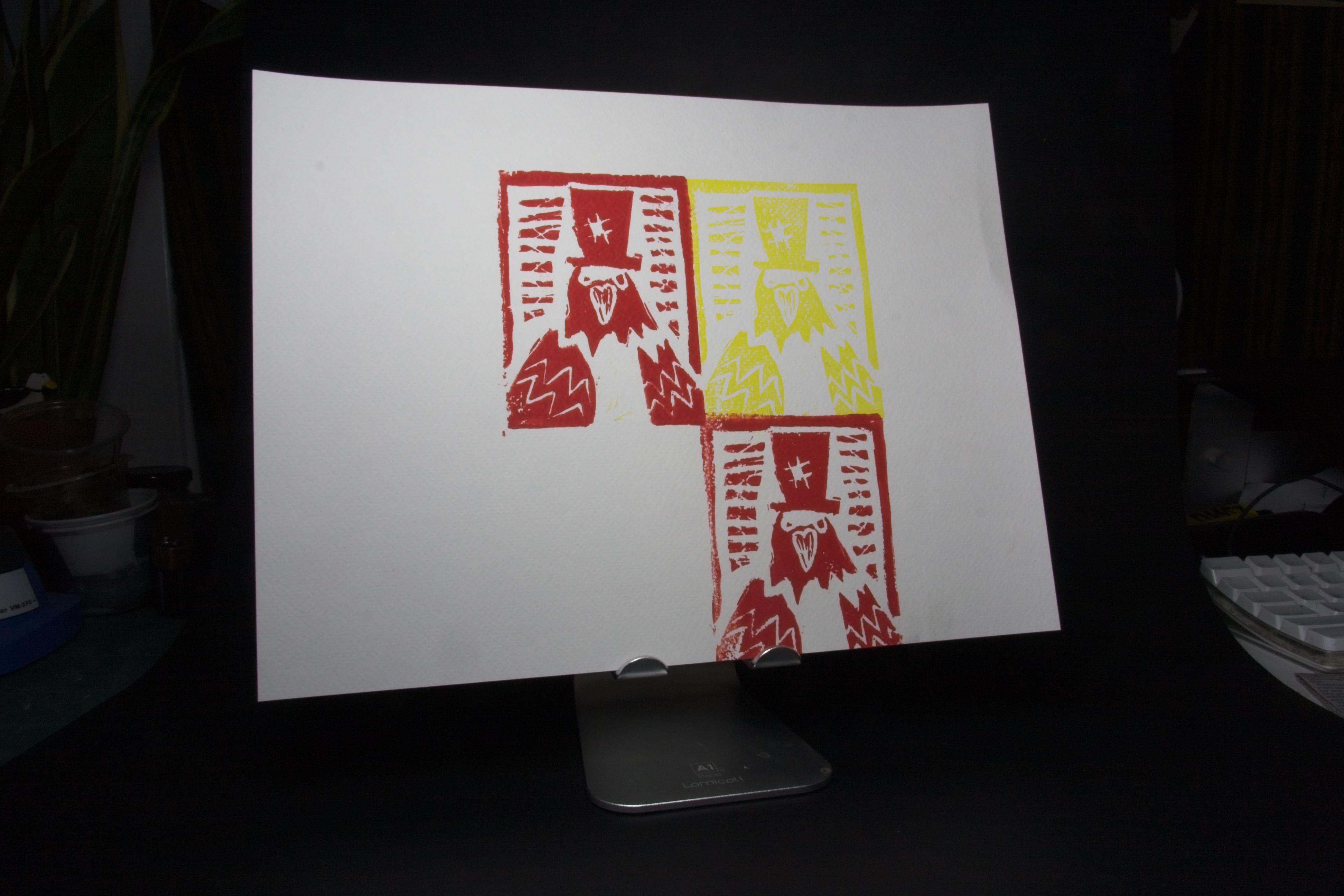 Pigeon with a hat in red and yellow ink