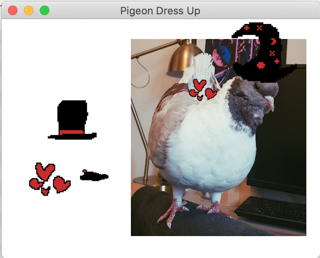 Pigeon Dress Up toy, with a modena pigeon and pixel art hats