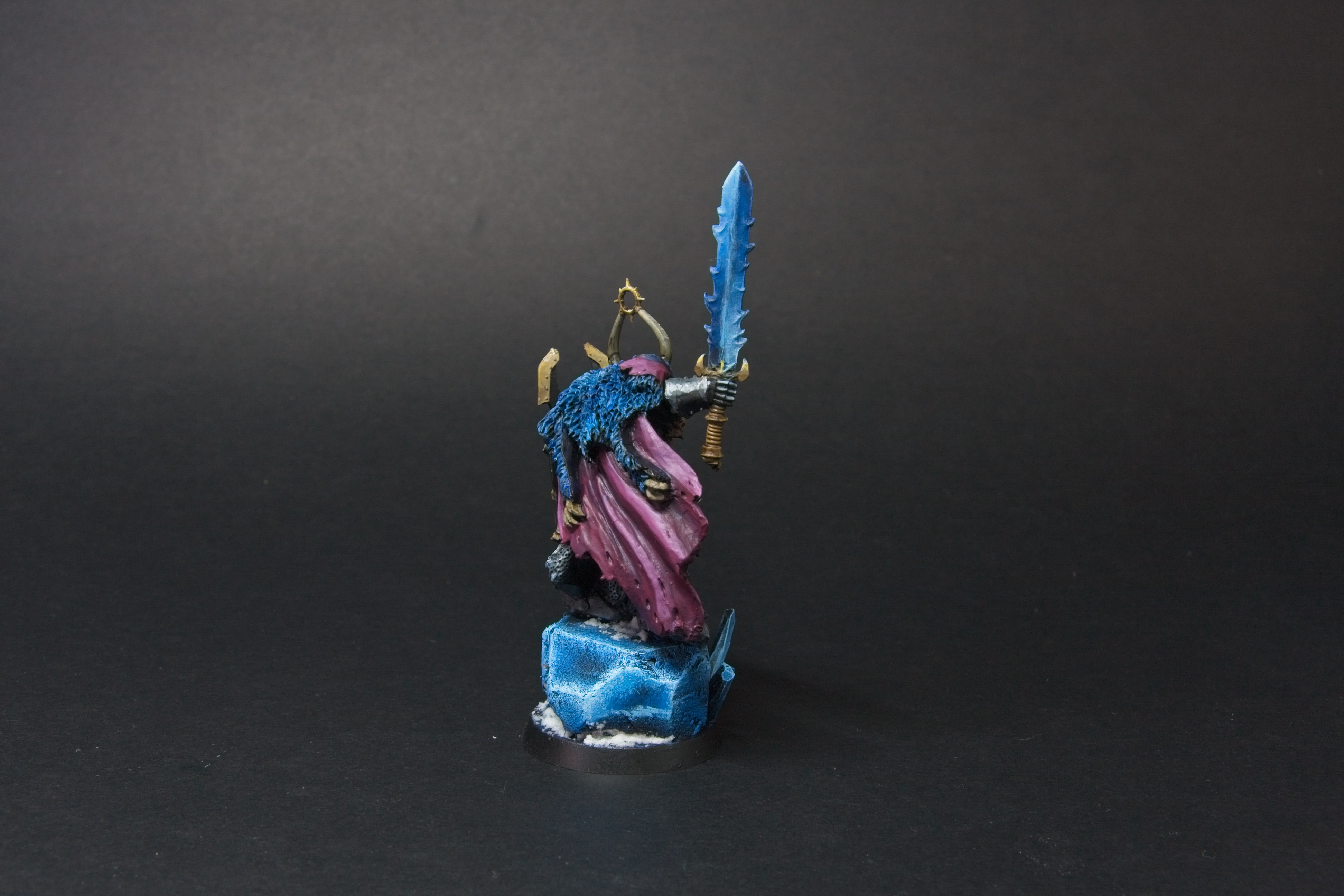 His sword a powerful blue, with alternating high and low lights.