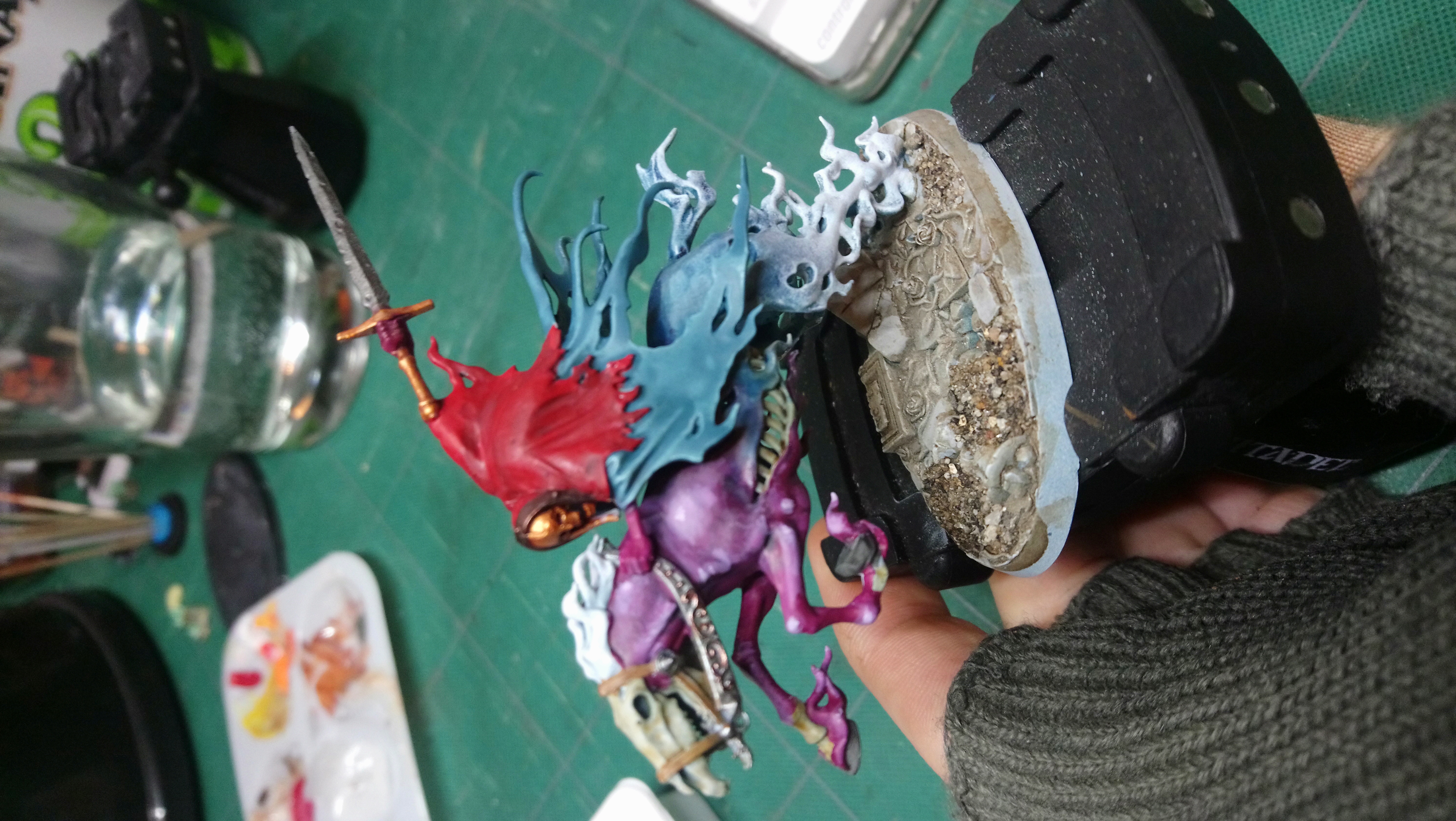 A nighthaunt unit with a blue cape.