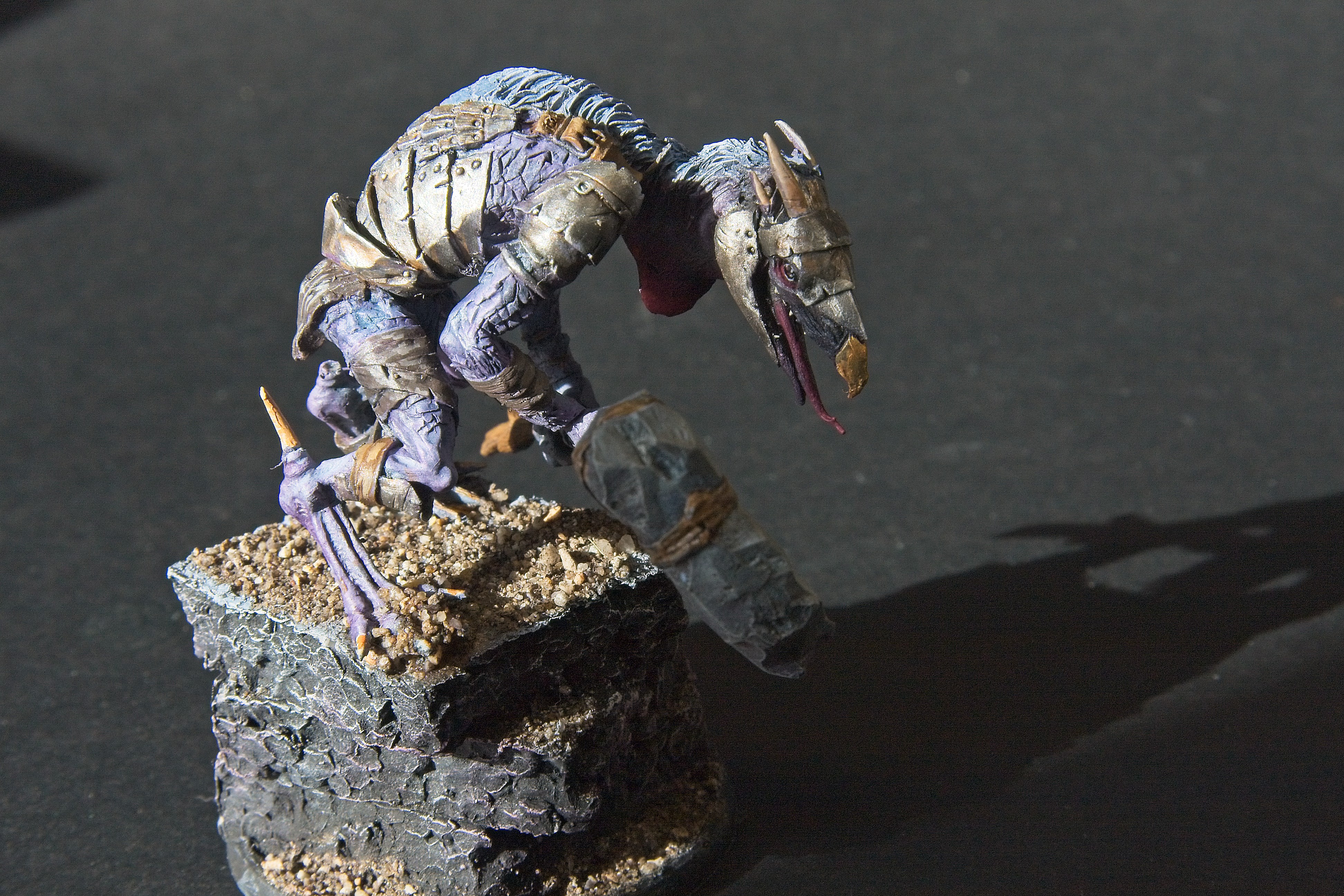 Plates of metal protect the left-side of this creature.