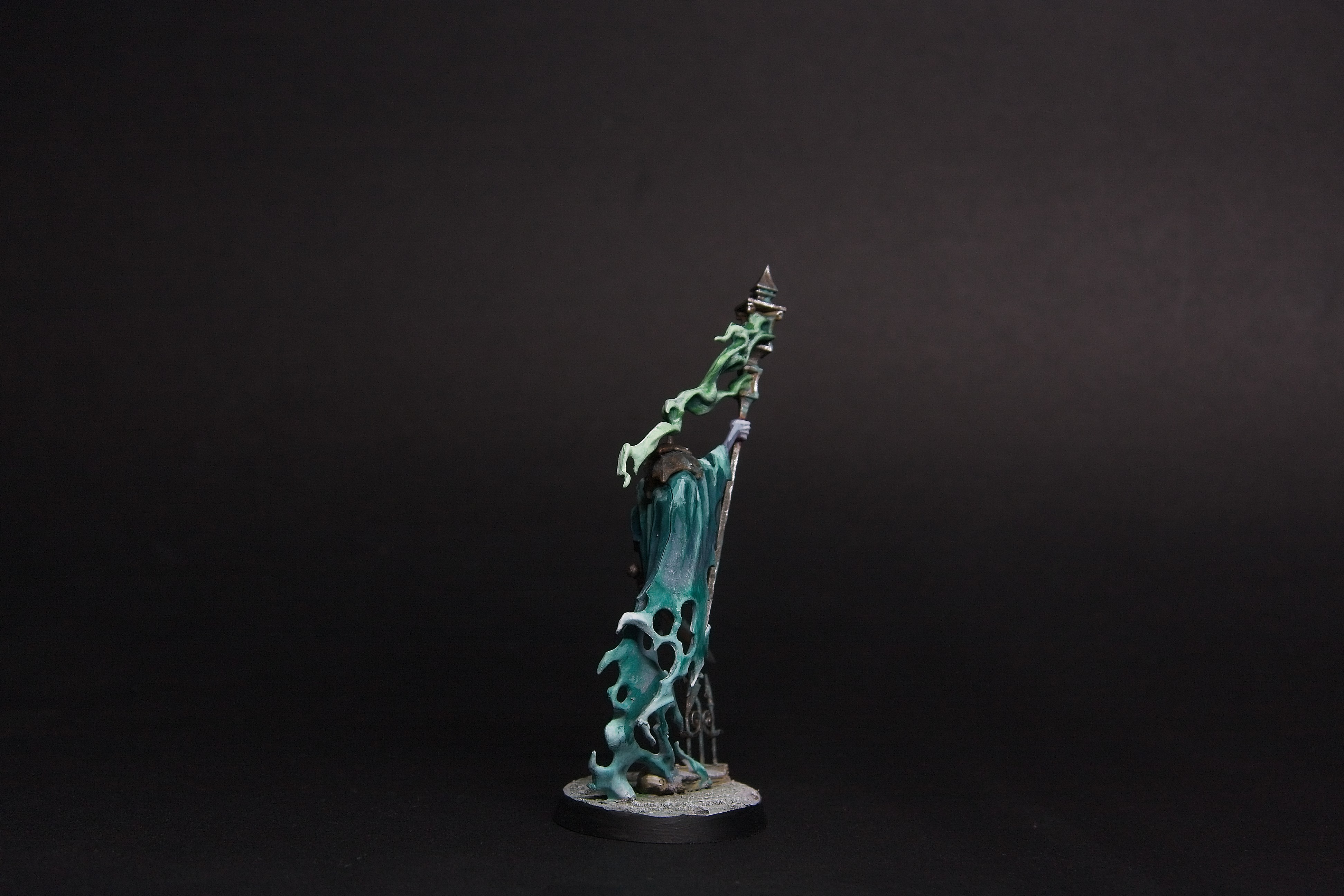 The emerald cloak dissipates into smoke.