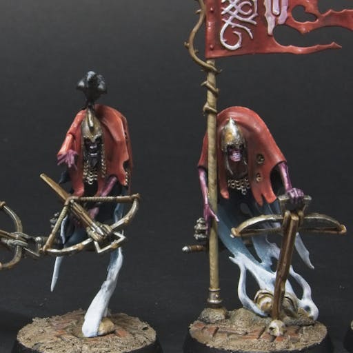 Two ghost crossbow men, one pointing with a crow on its head, and one with a banner.