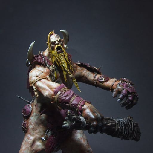 A mega-gargant, with pallid skin, purple clothes, and a yellow-gold beard.