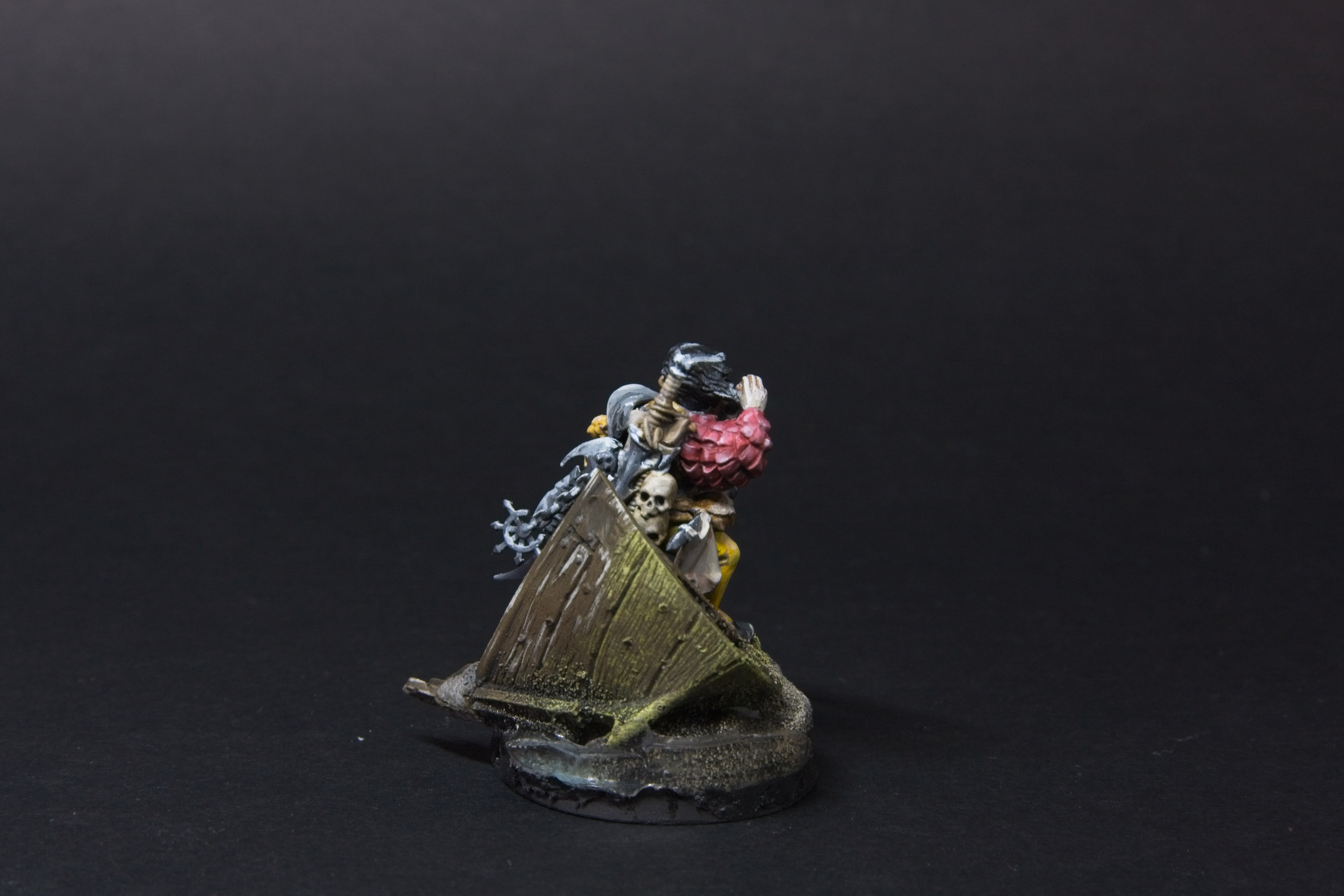 The boat covered in green sea moss.