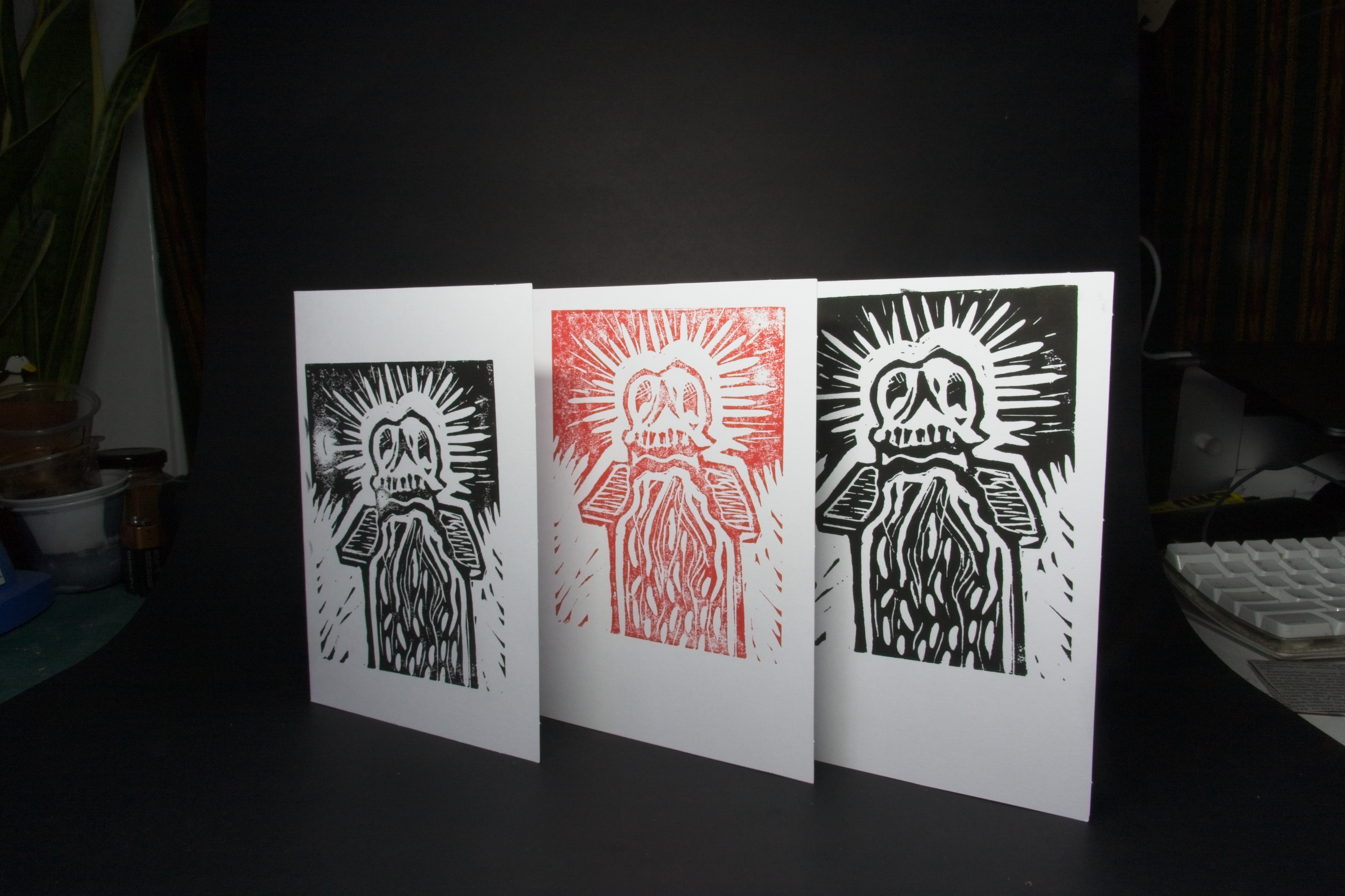 Skull lino print in black and red ink