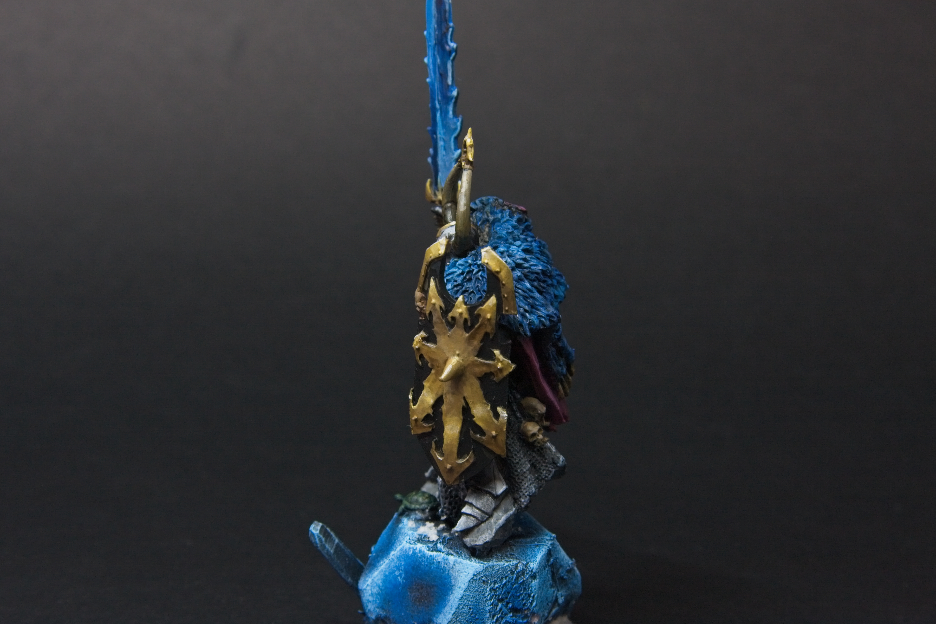 A golden non-metallic metal shield.