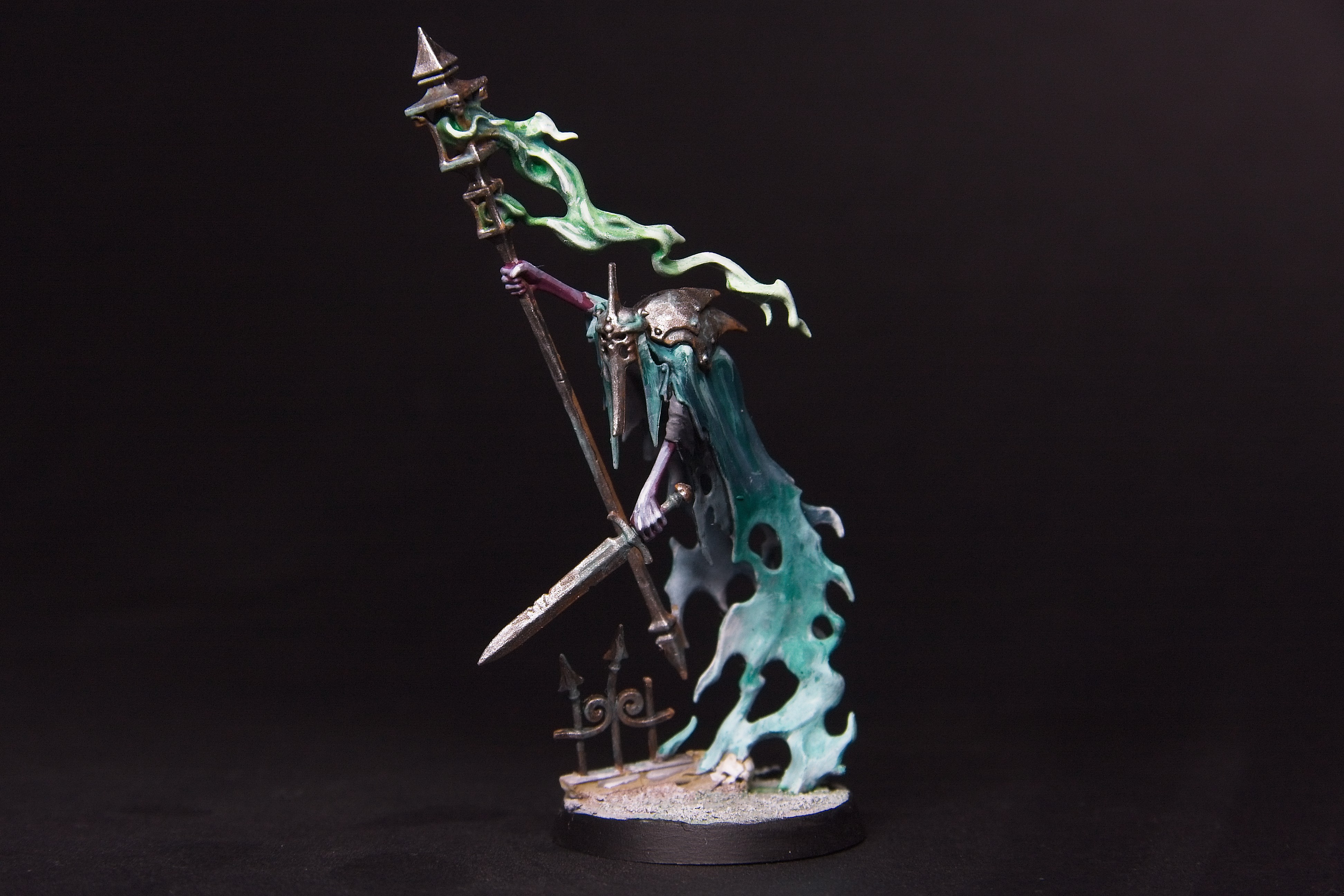 A guardian of souls, wielding a sword and a lantern - both rusted beyond repair.