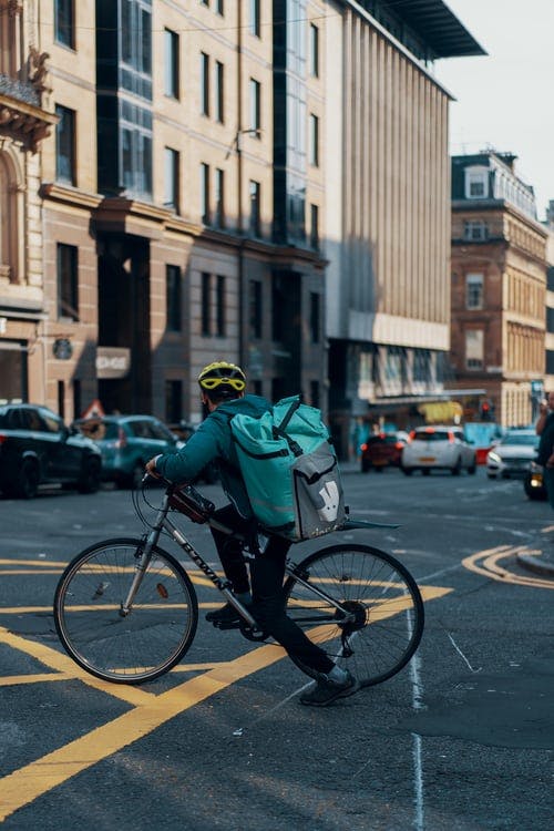 deliveroo cyclist on road