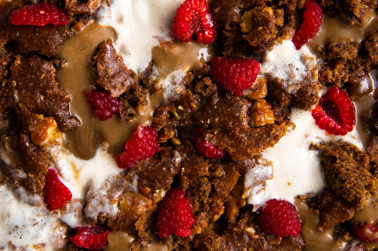 blondies topped with caramel and raspberries