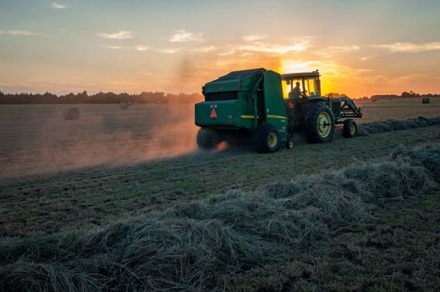 tractor ploughing a field