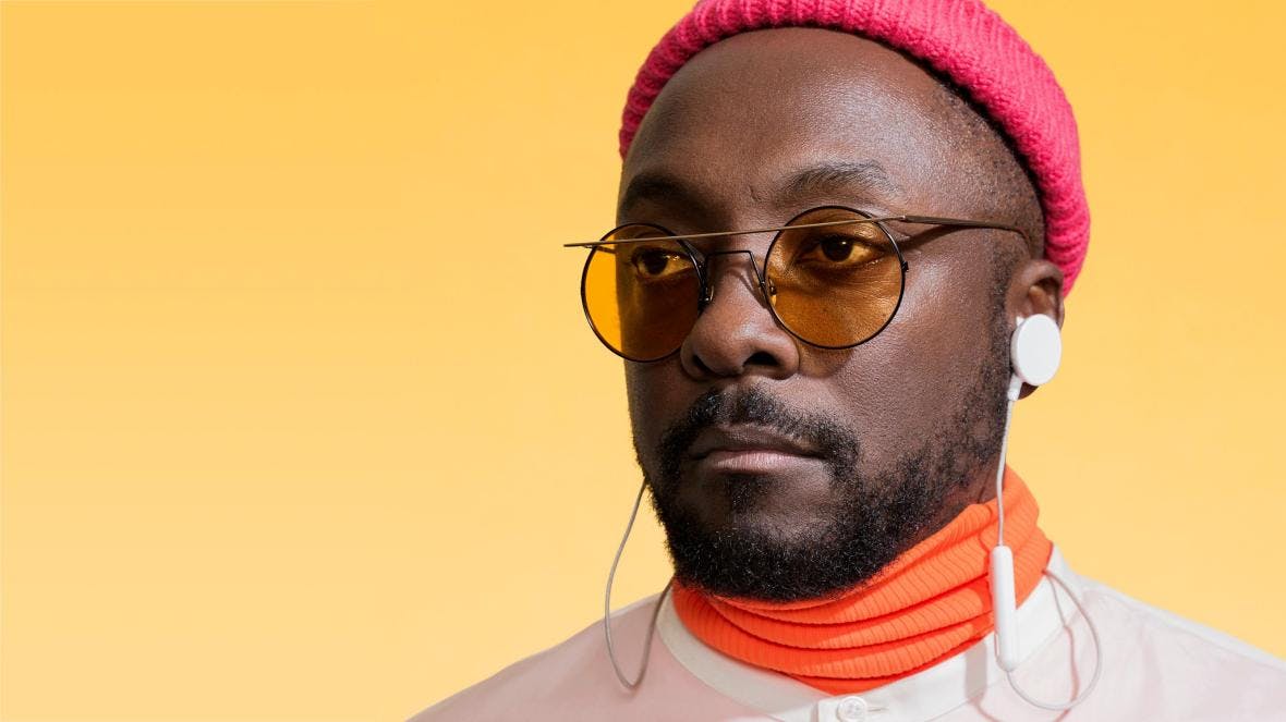 will.i.am yellow background and hat