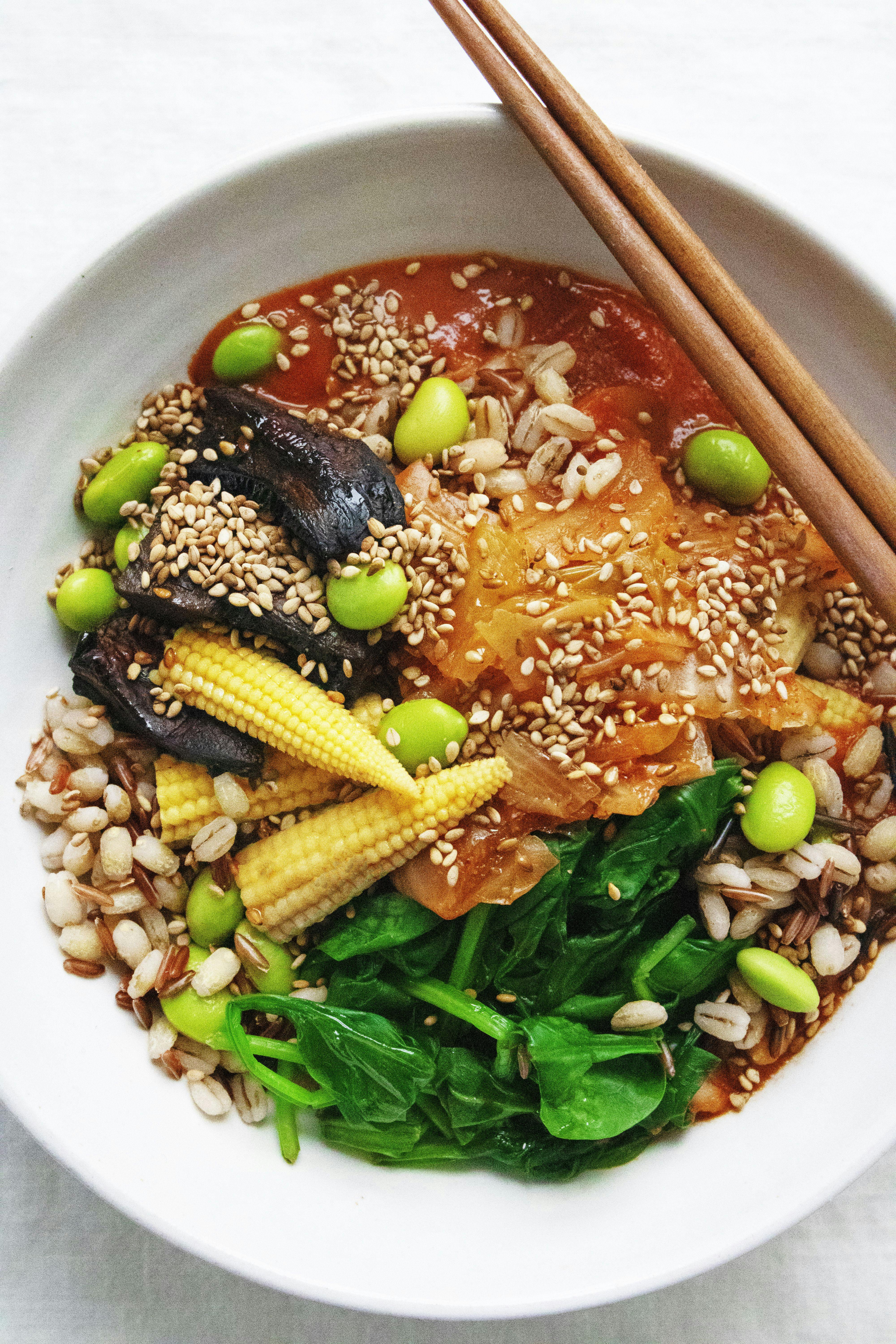 kimchi grain bowl with chopsticks