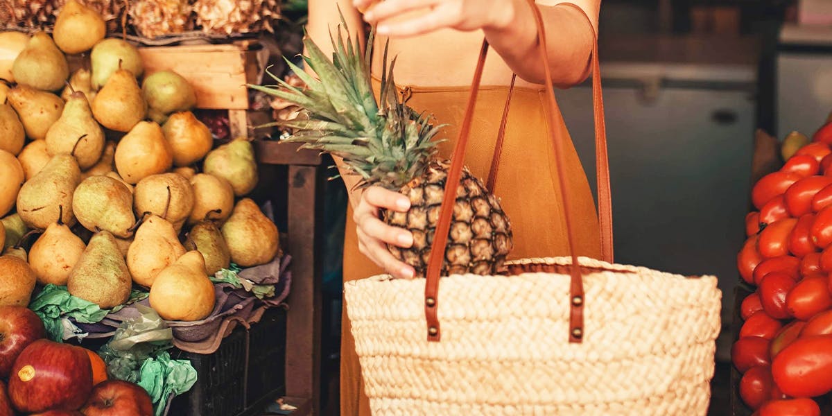 Woman using moroccan basked instead of plastic bag