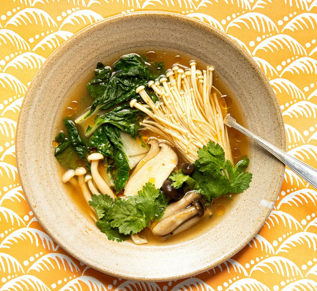 mushroom tom yum on a yellow background