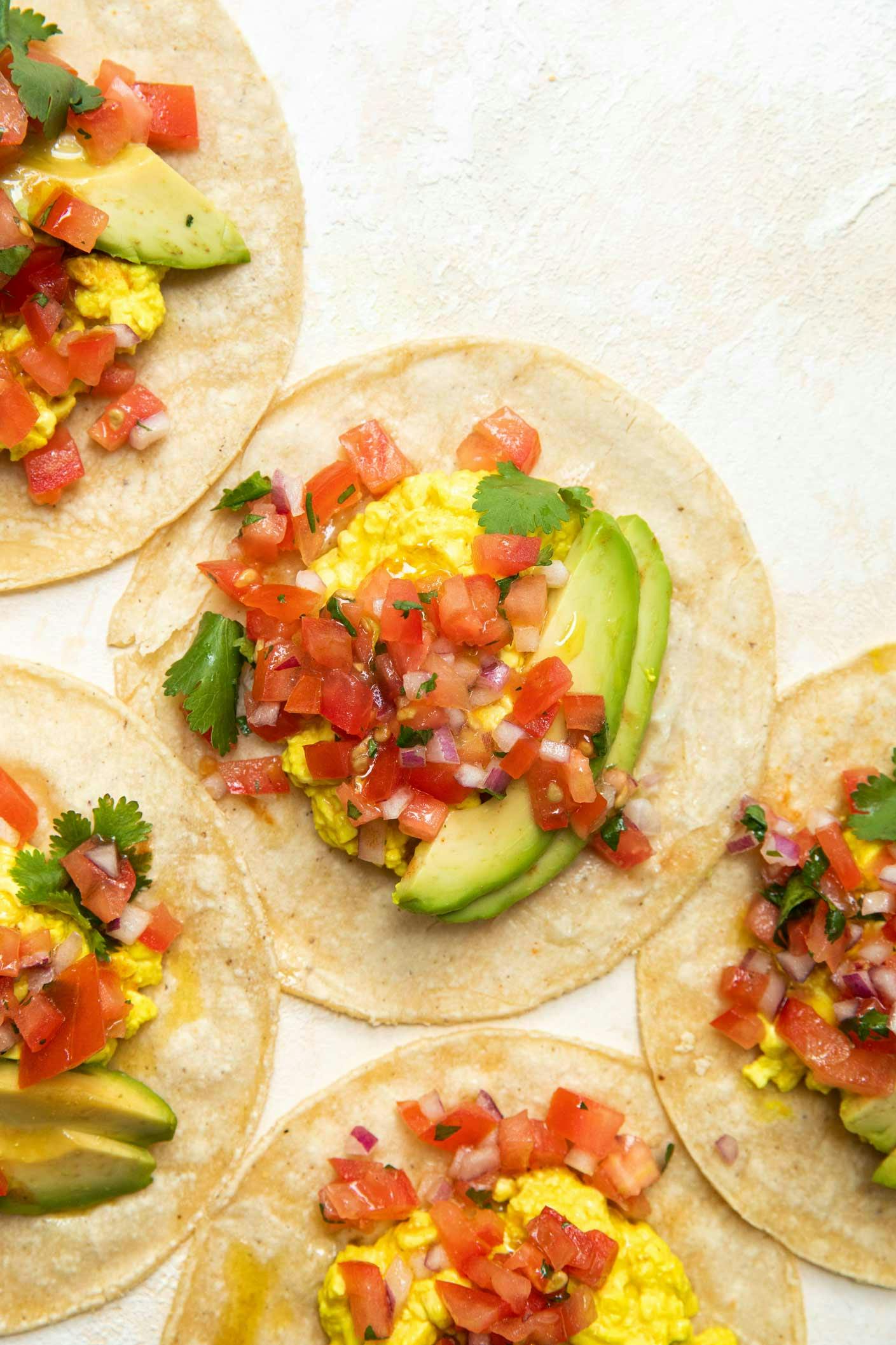 breakfast tacos on white background