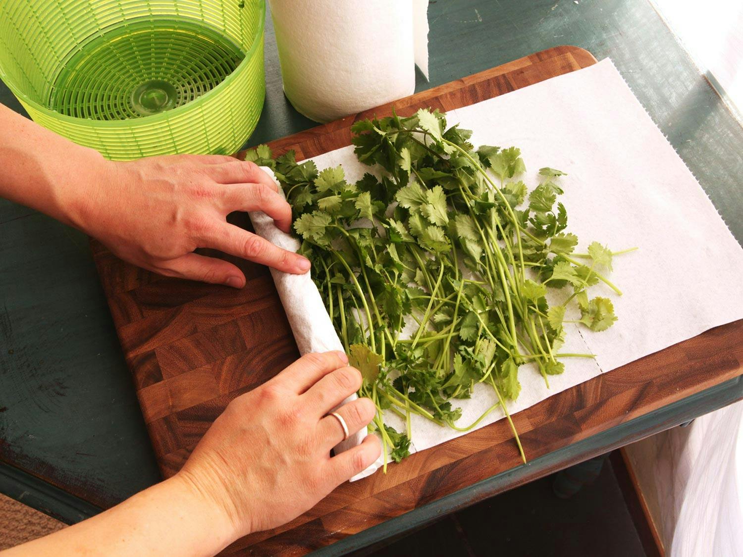 rolling herbs in paper