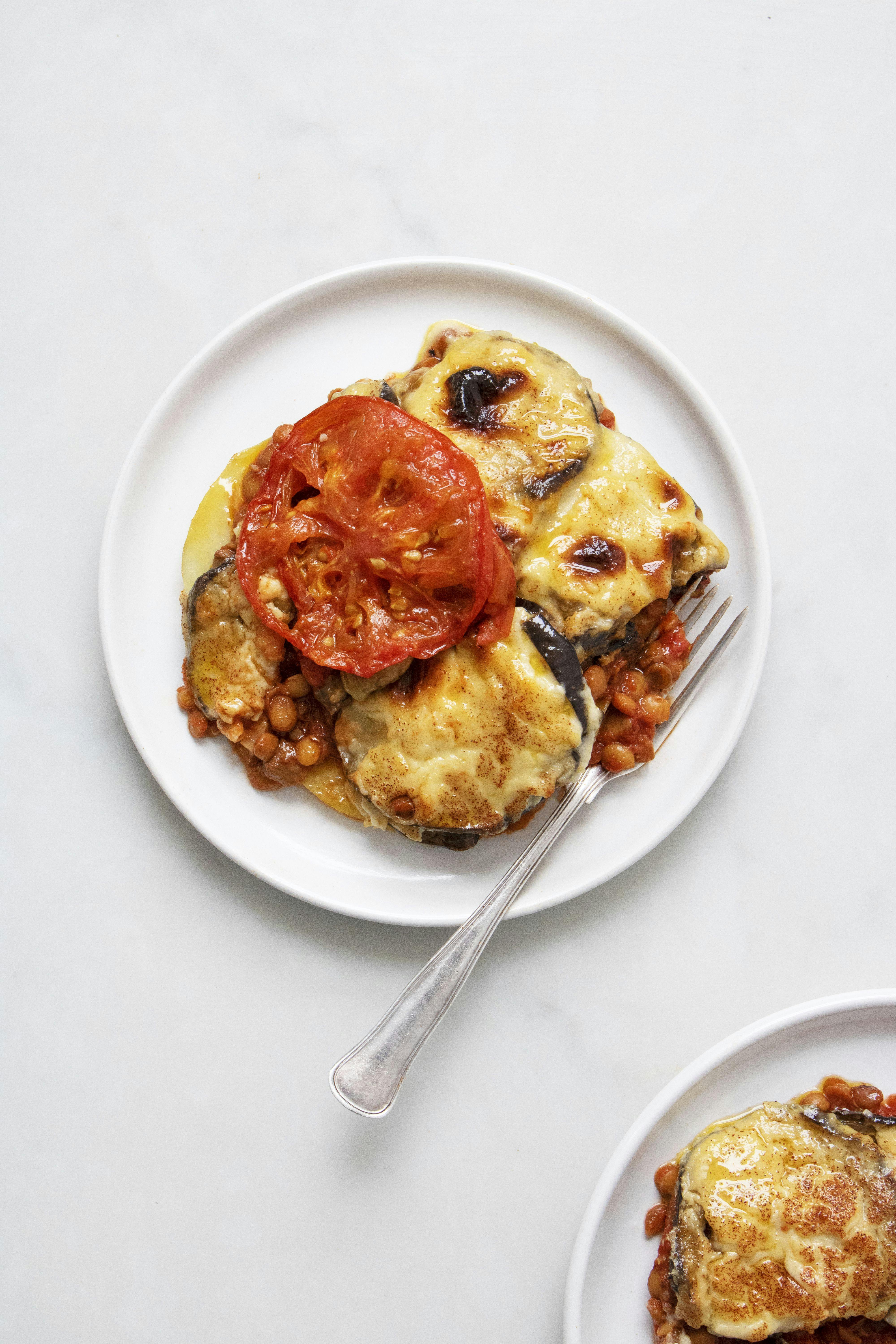 plate of moussaka with fork