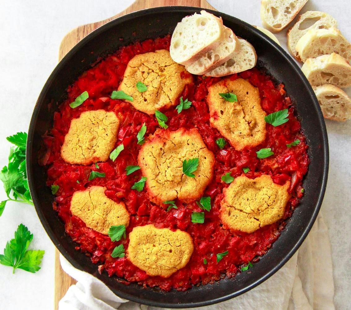 vegan shakshuka with chickpea eggs in a pan