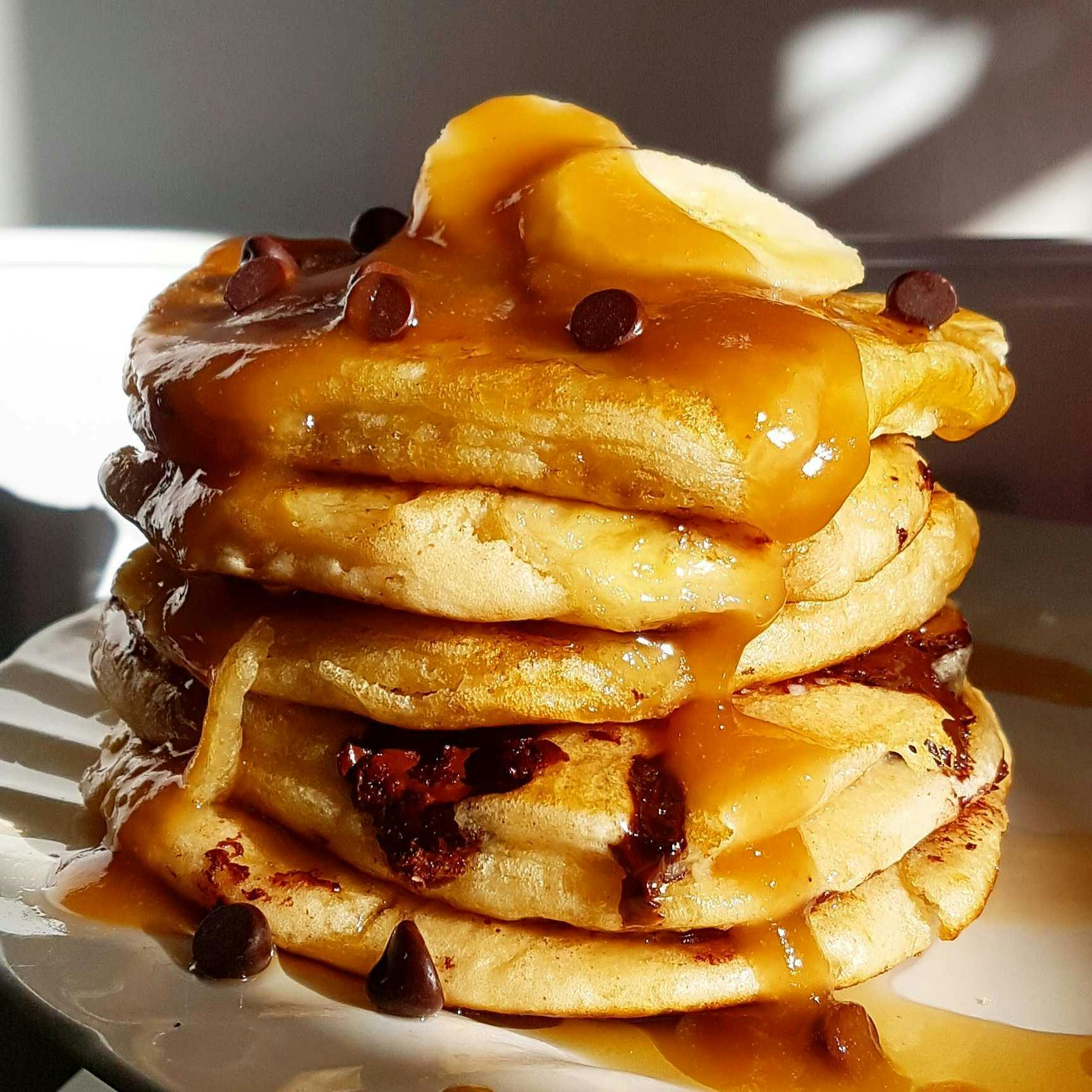 peanut butter and banana pancakes with peanut butter caramel