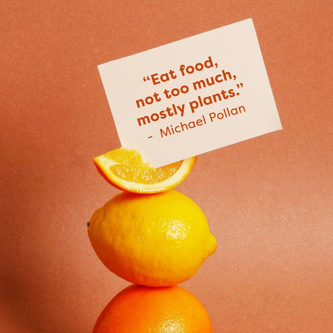 lemons with a quote in that says "eat food, not too much, mostly plants" – Michael Pollan