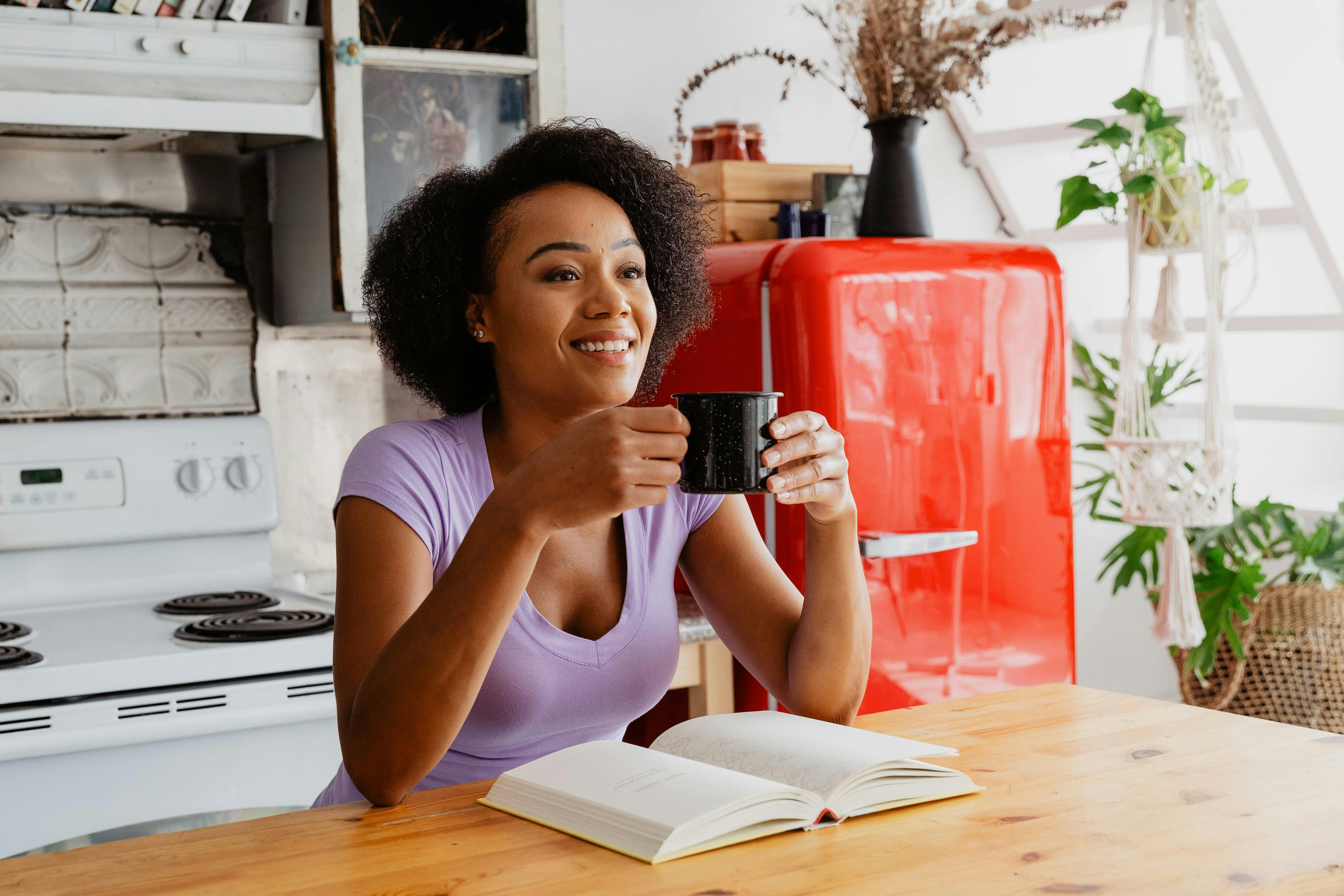 woman drinking a cup of coffee