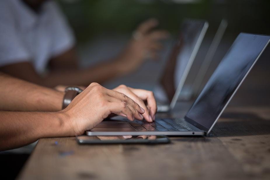 people working on laptops