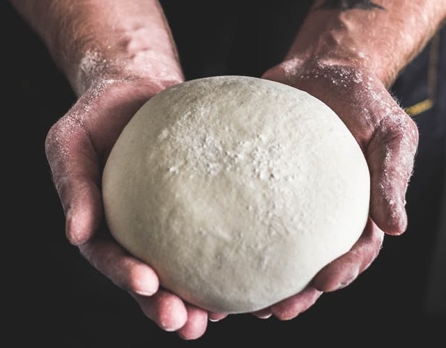 ball of dough in hands