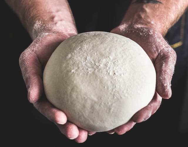 dough ball in hands