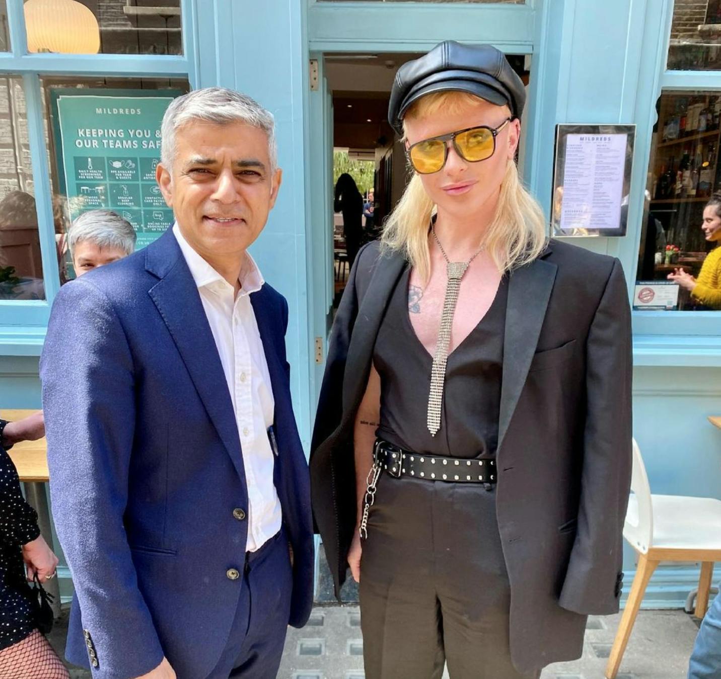 bimini and sadiq outside a cafe