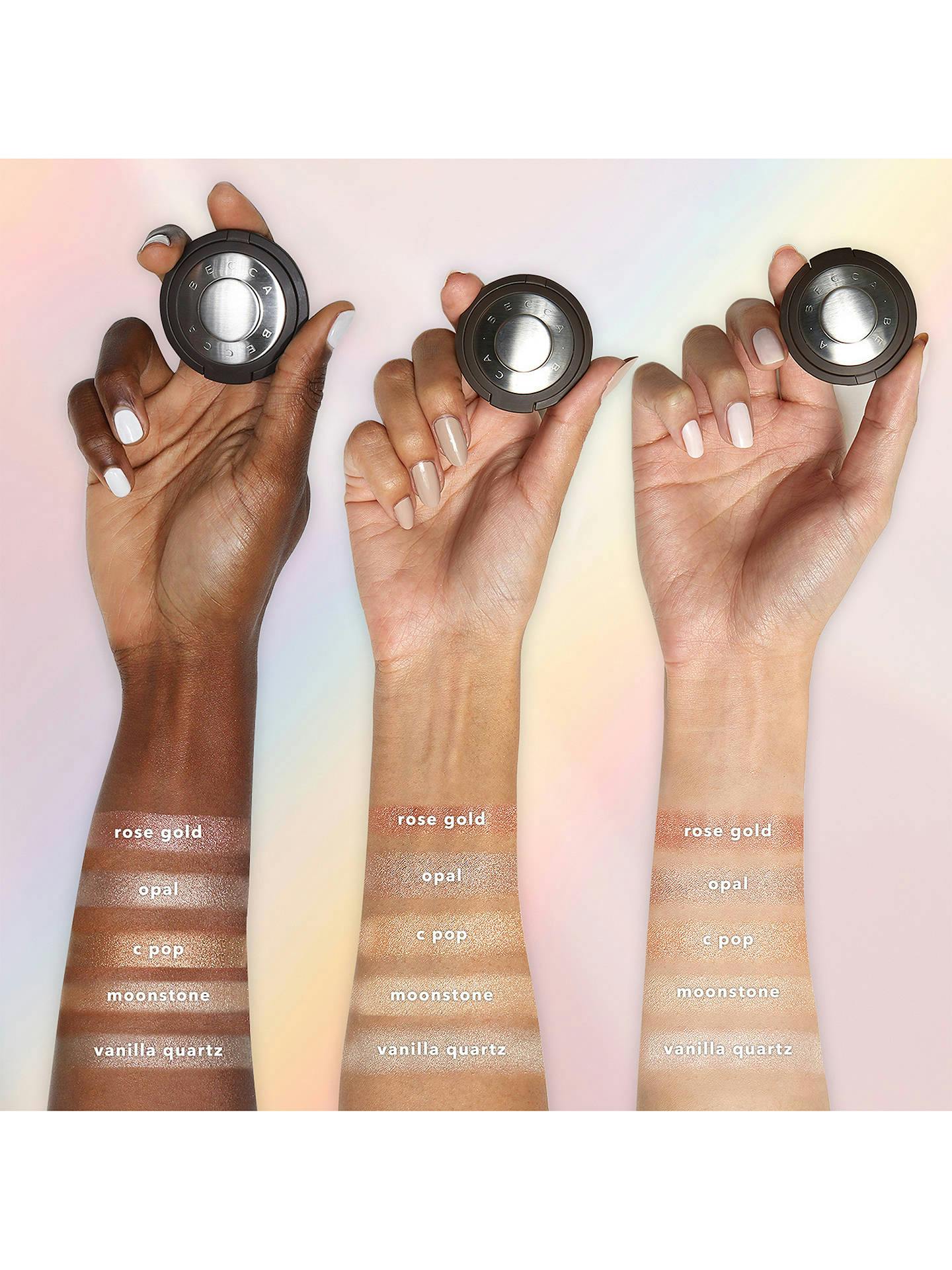 Becca highlighter swatches on three different arms