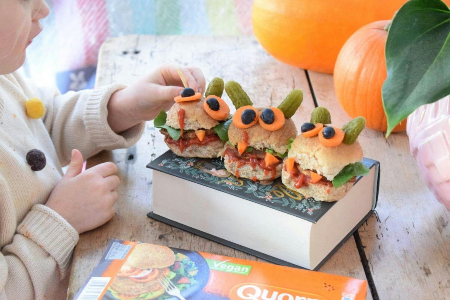 three quorn monster burgers with child