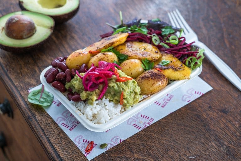 vegan columbian food on wooden table