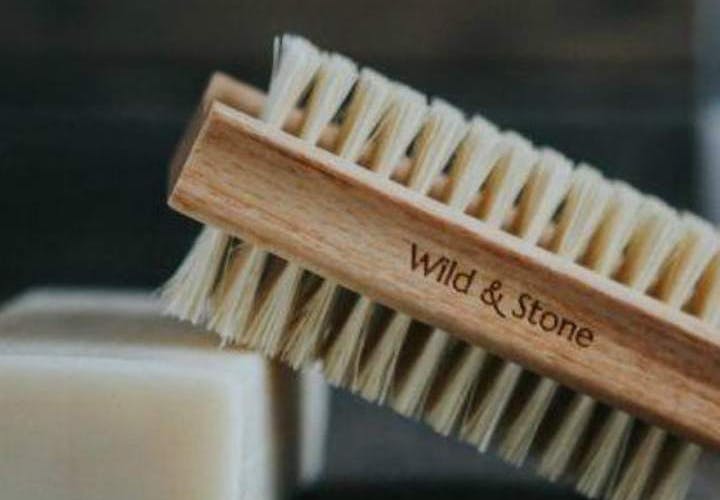 a wooden nail brush