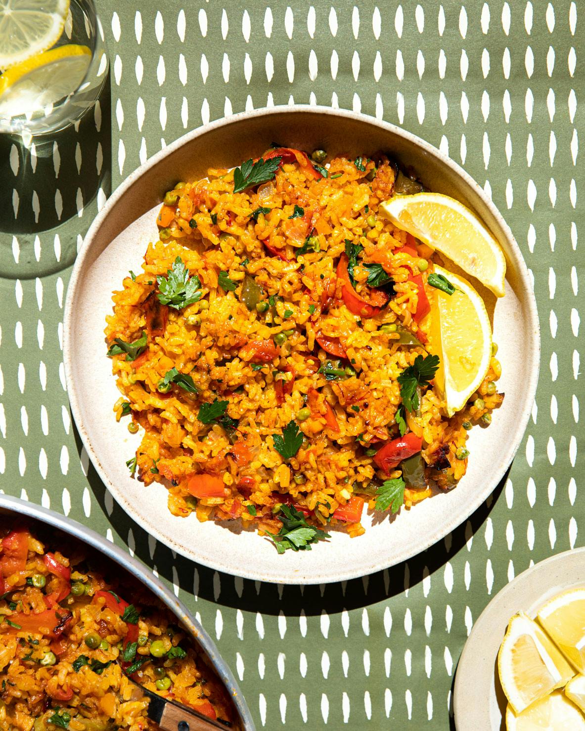 Plate of paella and lemons