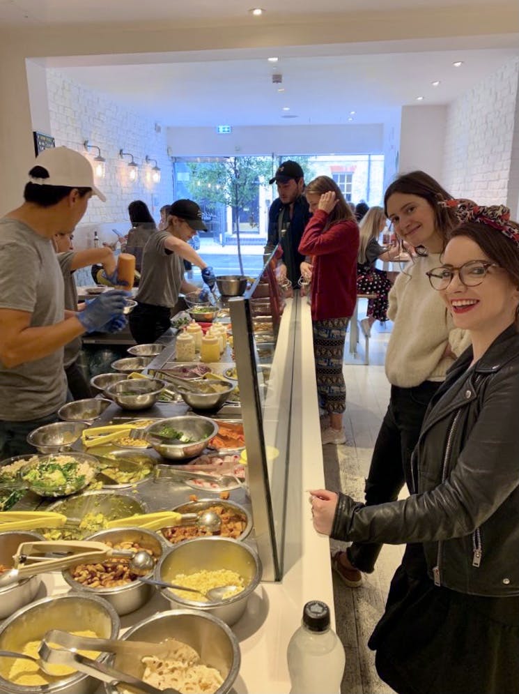 laura and val in front of food